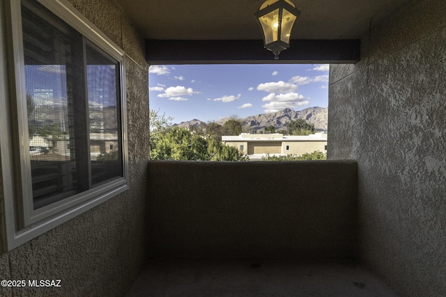 balcony featuring a mountain view