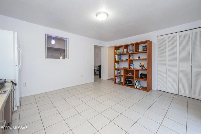 interior space featuring light tile patterned flooring