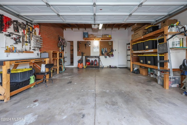 garage featuring a workshop area