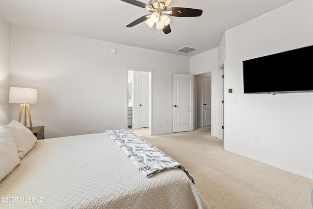 bedroom featuring a ceiling fan, light colored carpet, visible vents, and baseboards