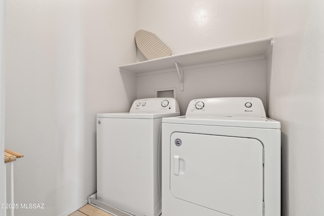 laundry room with laundry area and washer and dryer