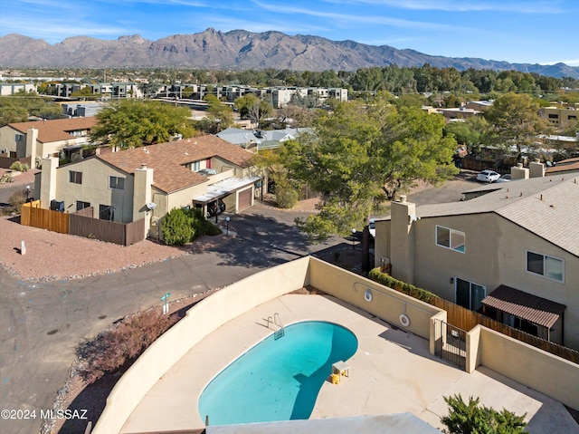 860 E Horsetail Ln, Tucson, AZ 85719 - pool with a residential view, a fenced backyard, and a mountain view