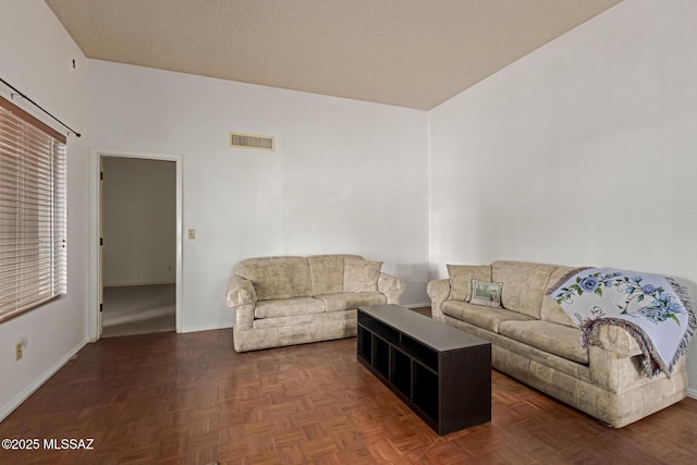 living room with visible vents