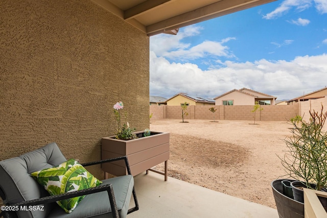 view of patio featuring a fenced backyard