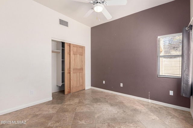 unfurnished bedroom with a ceiling fan, a closet, visible vents, and baseboards