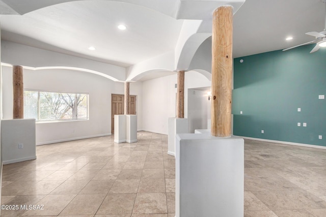 spare room featuring ceiling fan, decorative columns, baseboards, and recessed lighting