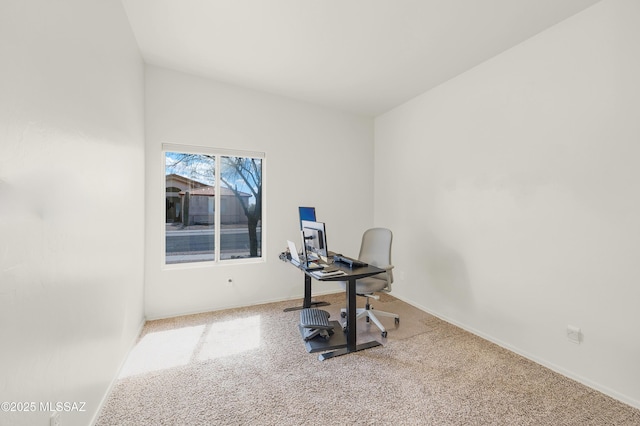 office space featuring baseboards and carpet flooring