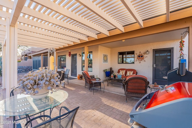 view of patio / terrace with an outdoor hangout area, a pergola, and outdoor dining space