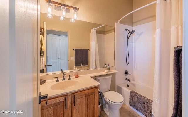 bathroom with toilet, shower / bath combo, and vanity