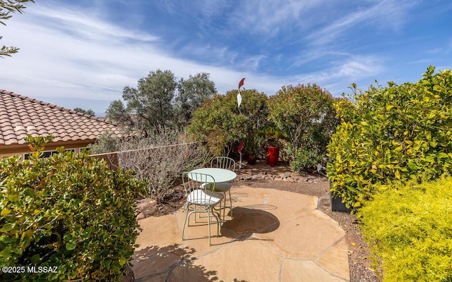 view of patio with fence