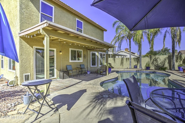 exterior space featuring a fenced in pool and a fenced backyard