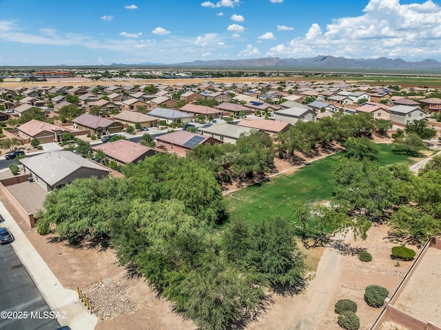 bird's eye view with a residential view and a mountain view