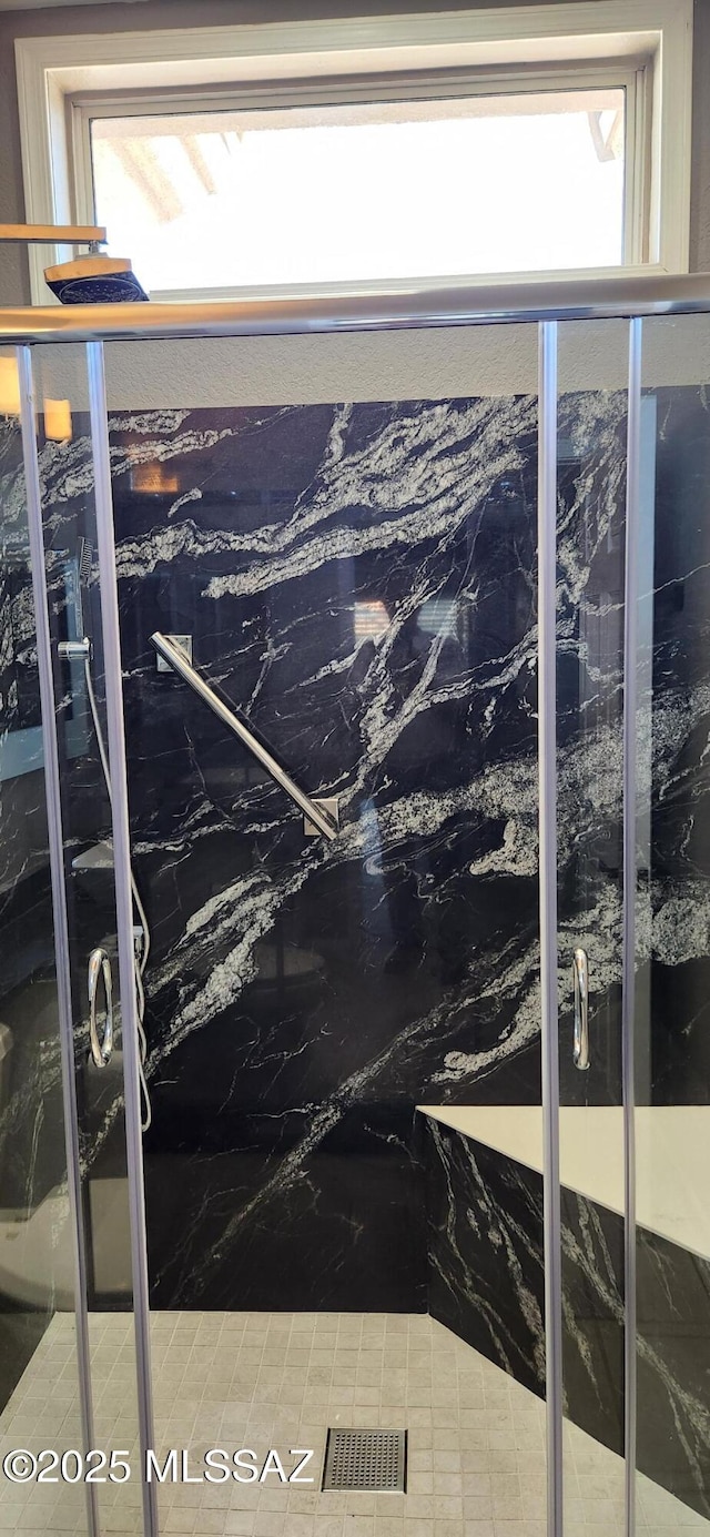 details with a marble finish shower