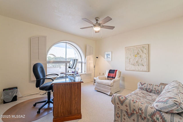 home office featuring ceiling fan, carpet flooring, and baseboards