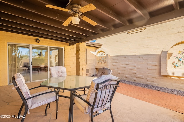 view of patio / terrace featuring ceiling fan and outdoor dining space