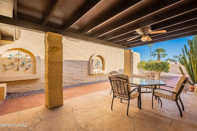 view of patio / terrace featuring outdoor dining area and a ceiling fan