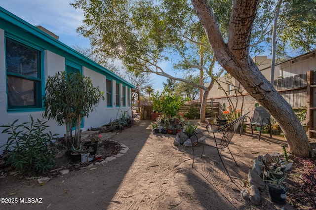 view of yard with a patio and fence