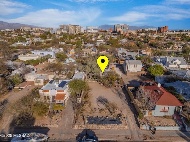 bird's eye view with a view of city and a mountain view