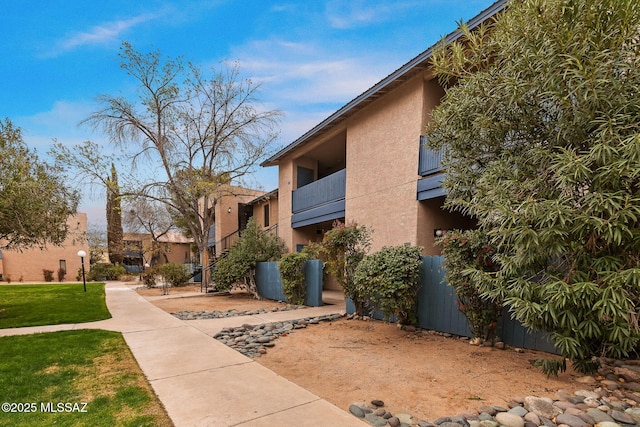 view of community featuring a yard