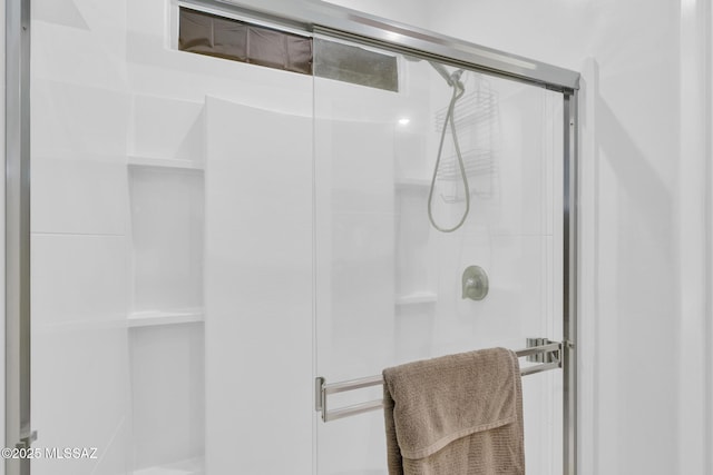 bathroom featuring a stall shower