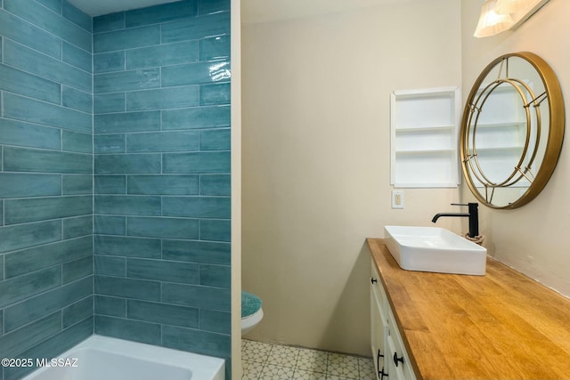 bathroom featuring shower / bathing tub combination and vanity