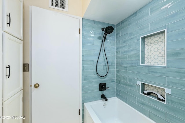 full bathroom featuring shower / bathtub combination and visible vents