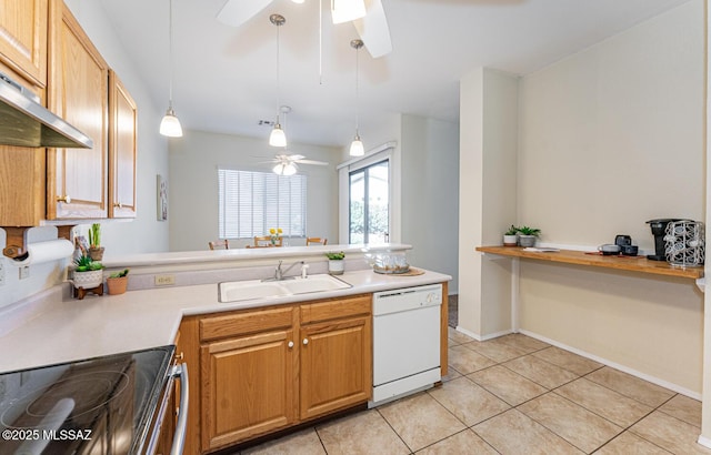 kitchen featuring light countertops, white dishwasher, a sink, a peninsula, and under cabinet range hood