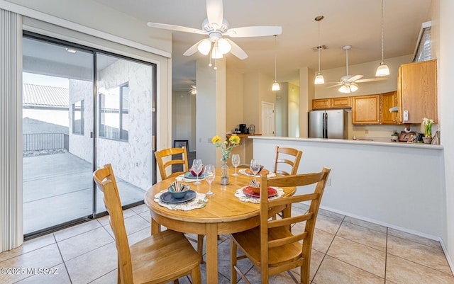 dining space with visible vents and light tile patterned flooring