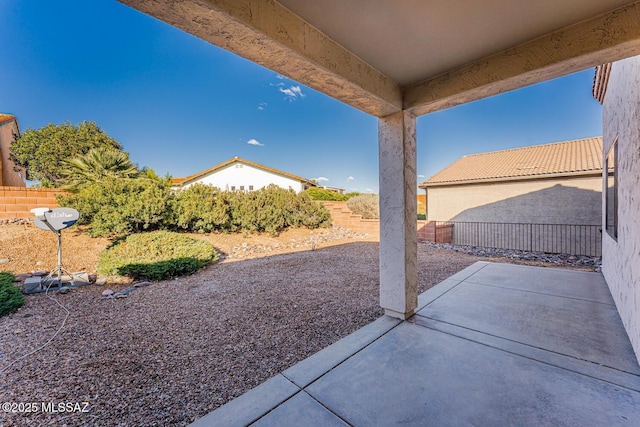 view of patio with fence