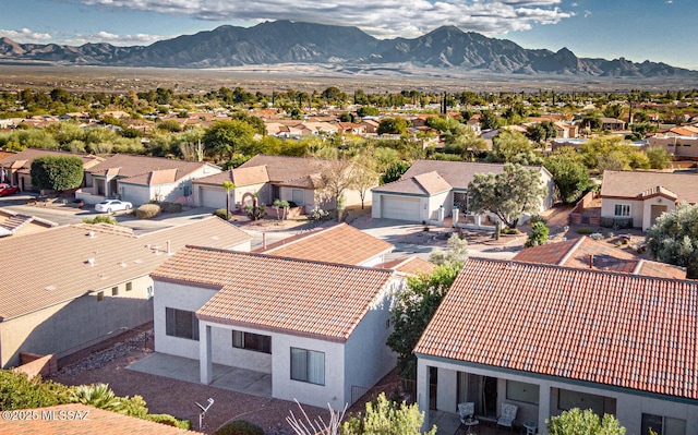 birds eye view of property featuring a residential view and a mountain view