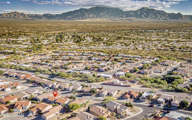 bird's eye view with a residential view and a mountain view