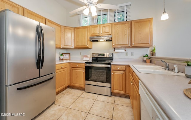 kitchen featuring light tile patterned floors, stainless steel appliances, light countertops, under cabinet range hood, and a sink