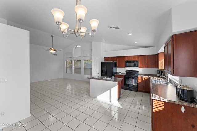 kitchen with dark countertops, visible vents, light tile patterned floors, ceiling fan with notable chandelier, and black appliances