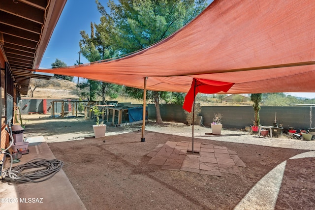 view of patio featuring a fenced backyard