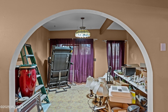 interior space featuring arched walkways