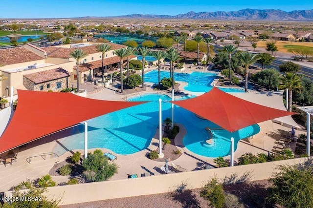 drone / aerial view featuring a mountain view and a residential view