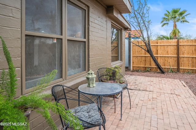 view of patio / terrace with fence