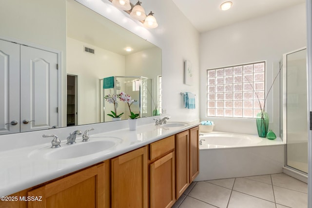 13827 E Fiery Dawn Dr, Vail, AZ 85641 - full bathroom with a stall shower, tile patterned flooring, and a sink