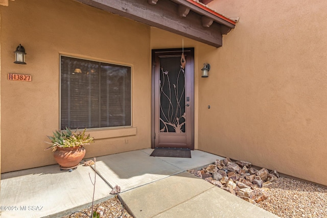 13827 E Fiery Dawn Dr, Vail, AZ 85641 - doorway to property featuring stucco siding