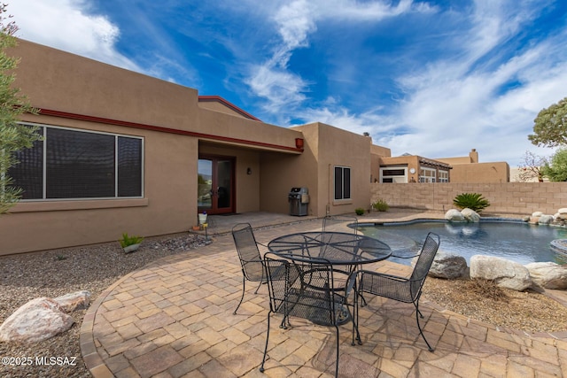 13827 E Fiery Dawn Dr, Vail, AZ 85641 - view of patio / terrace with fence and a fenced in pool