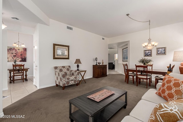 13827 E Fiery Dawn Dr, Vail, AZ 85641 - living room featuring visible vents, a notable chandelier, and light carpet
