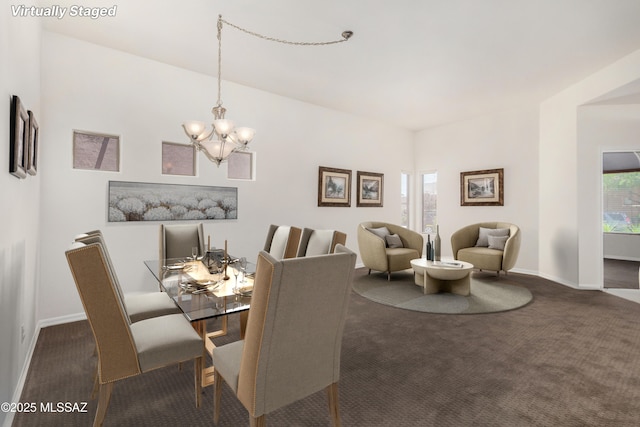 13827 E Fiery Dawn Dr, Vail, AZ 85641 - carpeted dining room featuring a chandelier and baseboards