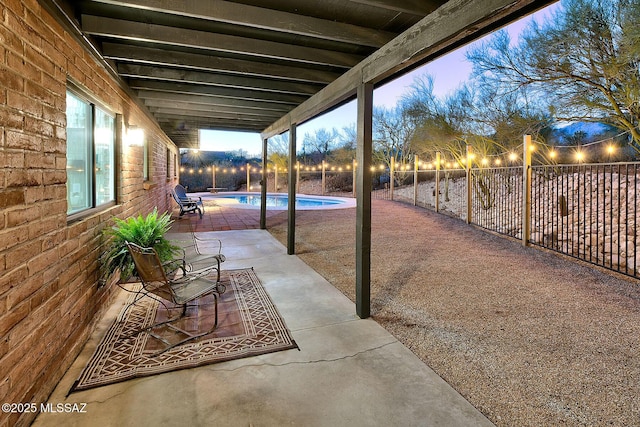 view of patio featuring a fenced backyard and a fenced in pool