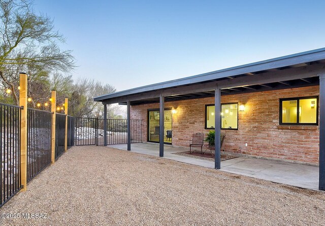 view of patio with fence