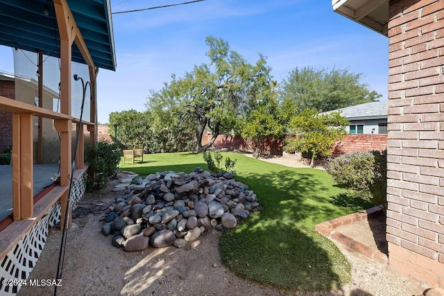 view of yard featuring fence