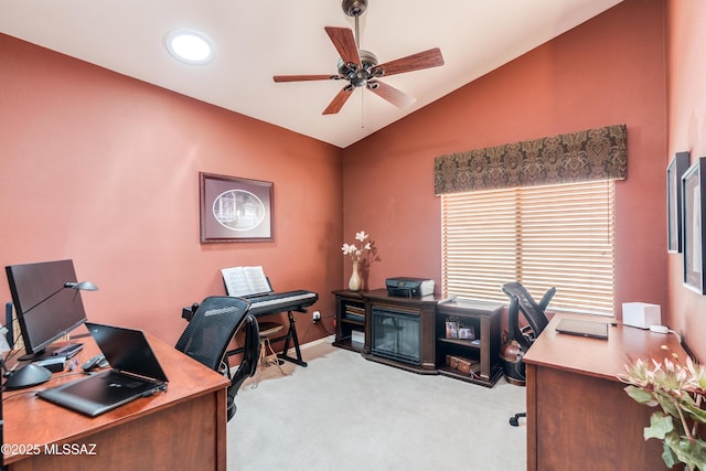 office with light carpet, a ceiling fan, and lofted ceiling