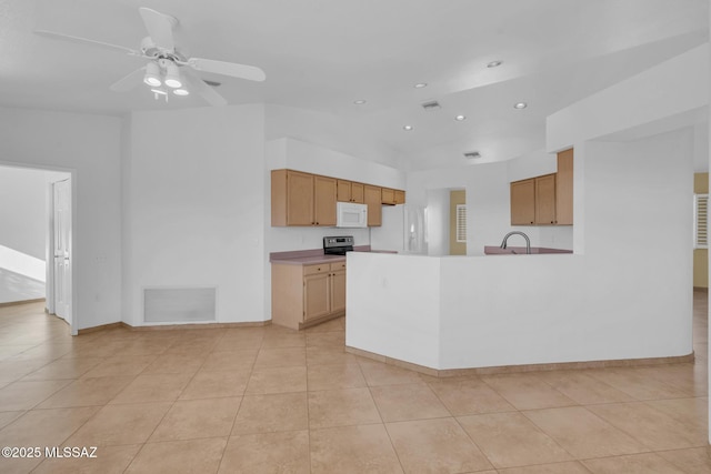 kitchen featuring a sink, visible vents, white appliances, and light tile patterned flooring