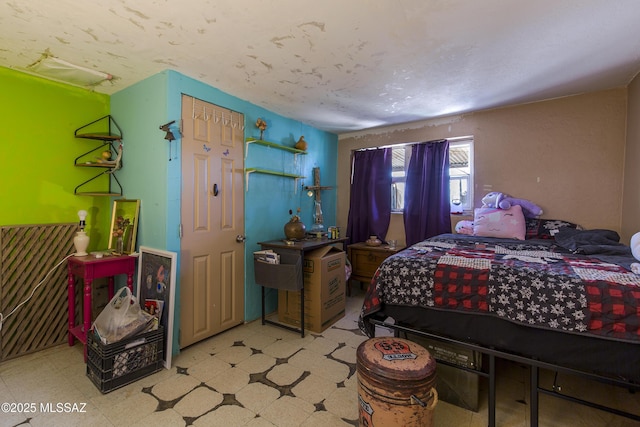 bedroom with tile patterned floors