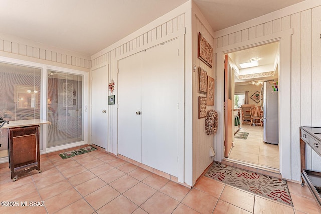 entrance foyer with light tile patterned floors