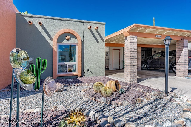 view of front of property featuring stucco siding